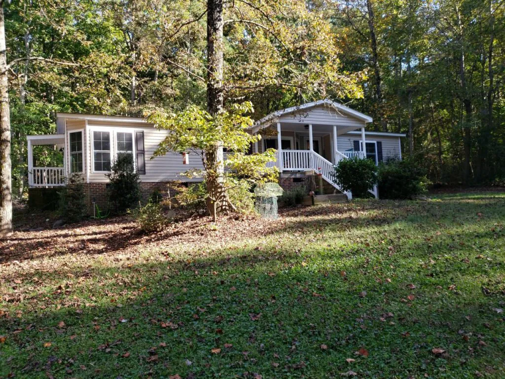 Completed architectural shingle roof replacement on a double-wide manufactured home